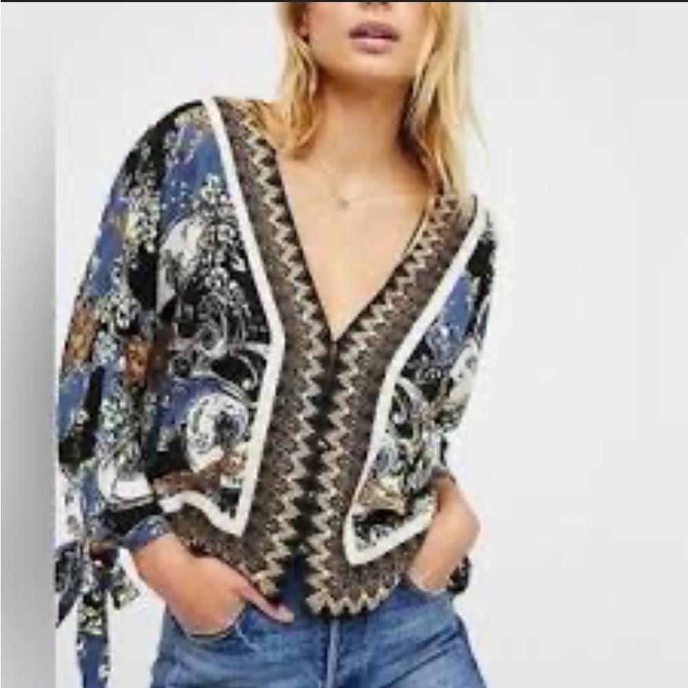 Free People size small Catch Me If You Can Multicolor Peplum Blouse